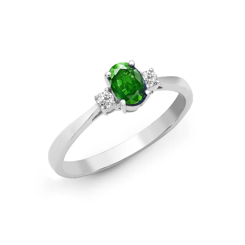 Modern gold oval engagement rings -18ct White Gold Diamond And Emerald And 3 Stone Ring