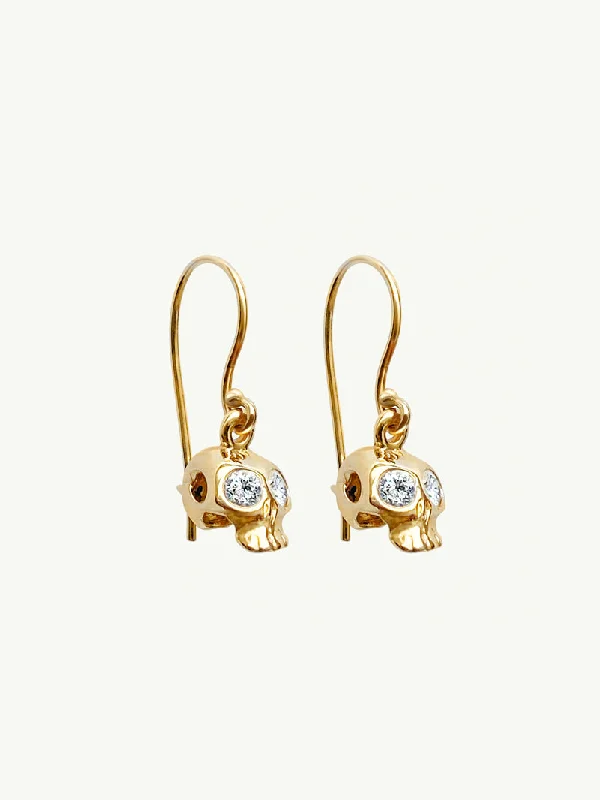 Ladies lightweight chandelier earrings -Memento Mori White Diamond Skull Earrings In 14K Yellow Gold