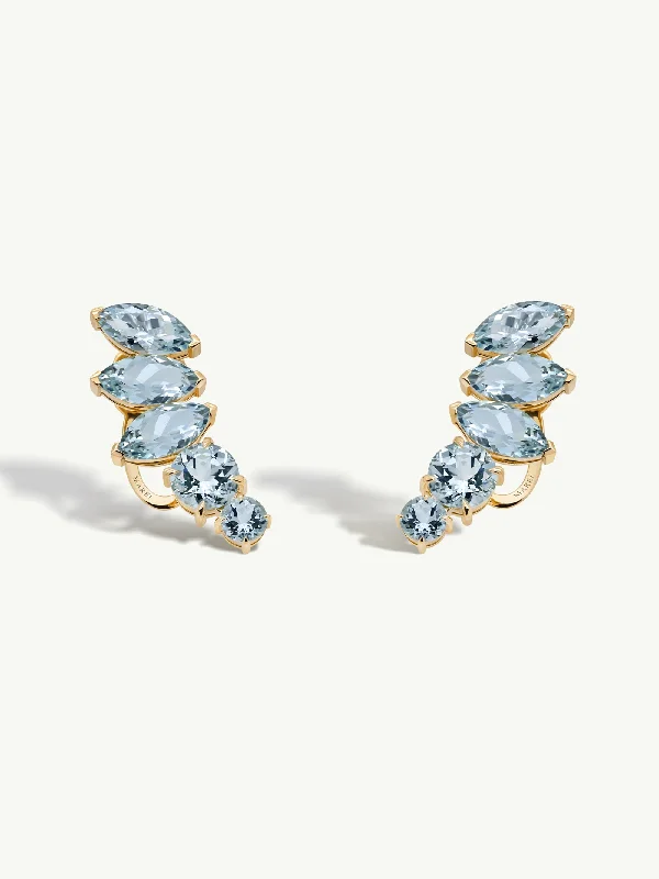 Modern geometric hoop earrings for women -Isadora Earrings With Blue Aquamarine Gemstones In 18K Yellow Gold