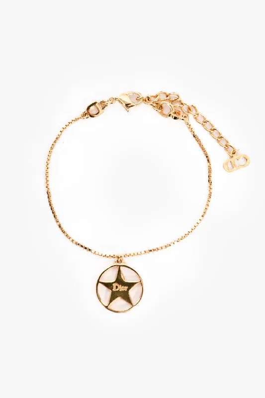 Ladies bold geometric bracelets -Christian Dior Gold Toned Star Bracelet