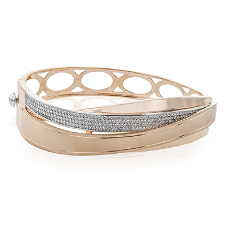 Ladies boho-inspired leather bracelets -This stunning wide bangle in 18K rose gold has undulating bands of both brushed and high polish surfaces, accented with 1.24 ctw of shimmering white diamonds.