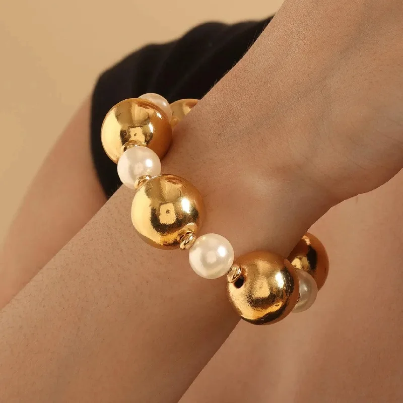 Ladies vintage-inspired bangle bracelets -TFC Bold And Gold Pearl Bead Bracelet