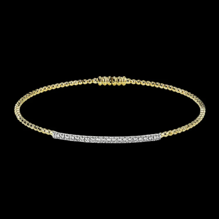 Ladies bold geometric bracelets -18K YG beaded bangle with a bar of shimmering diamonds in the center 0.28 ctw, and a magnetic closure